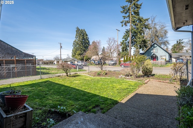 view of yard featuring fence