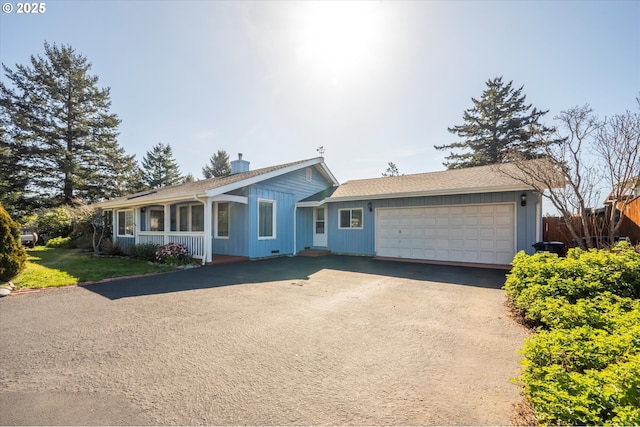 single story home featuring a shingled roof, fence, aphalt driveway, a chimney, and an attached garage