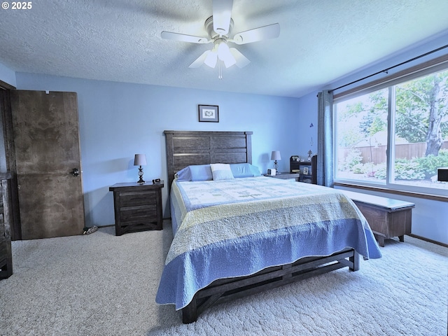 288 N Dorcas Dr, Keizer, OR 97303 - bedroom with carpet floors, a textured ceiling, and ceiling fan