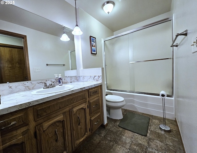 288 N Dorcas Dr, Keizer, OR 97303 - bathroom featuring vanity, shower / bath combination with glass door, and stone finish floors