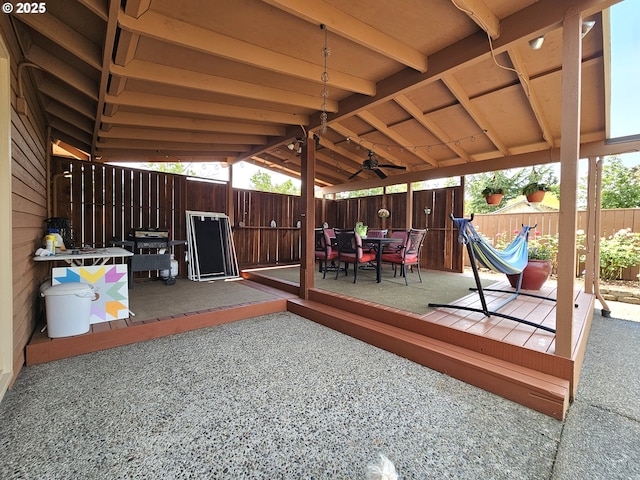 288 N Dorcas Dr, Keizer, OR 97303 - wooden deck with outdoor dining area and a fenced backyard