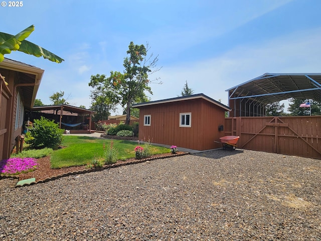 288 N Dorcas Dr, Keizer, OR 97303 - view of yard featuring a gate and a carport