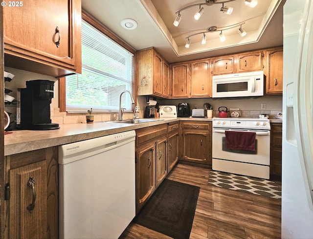 288 N Dorcas Dr, Keizer, OR 97303 - kitchen with white appliances, dark wood-style flooring, a raised ceiling, and light countertops