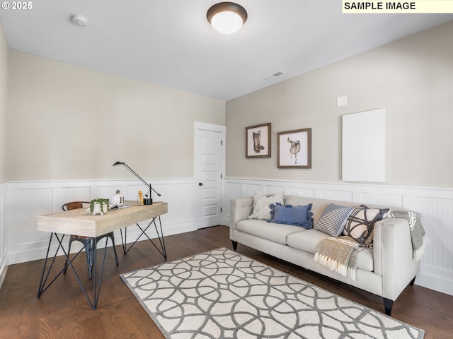 living room featuring dark wood-type flooring