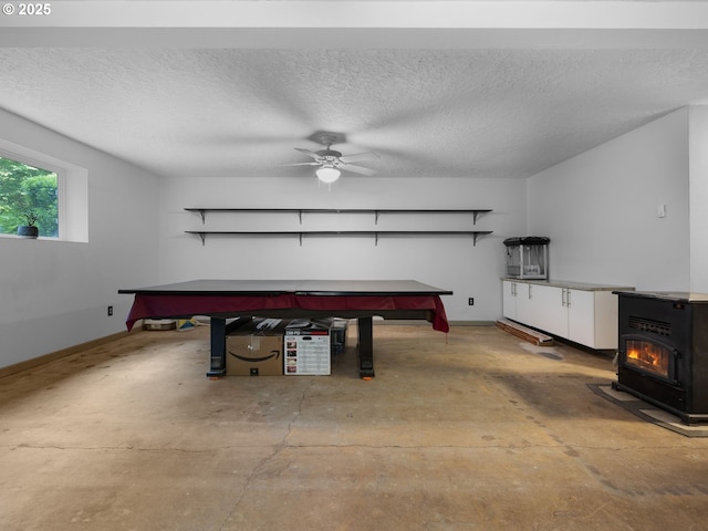 17222 SE Tickle Creek Rd, Boring, OR 97009 - game room featuring concrete floors, baseboards, a textured ceiling, and ceiling fan