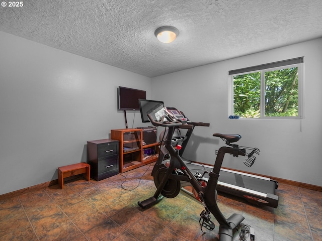 17222 SE Tickle Creek Rd, Boring, OR 97009 - exercise room with baseboards and a textured ceiling