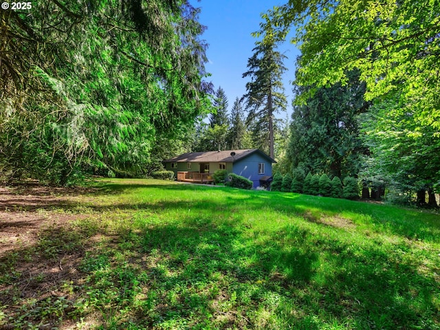 17222 SE Tickle Creek Rd, Boring, OR 97009 - view of green lawn with a wooden deck