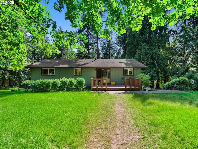 17222 SE Tickle Creek Rd, Boring, OR 97009 - back of property featuring a lawn, a wooden deck, and driveway