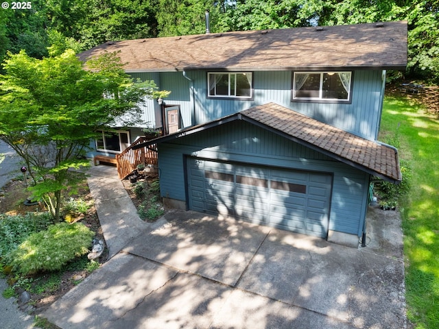 17222 SE Tickle Creek Rd, Boring, OR 97009 - split foyer home with a shingled roof, a garage, and concrete driveway