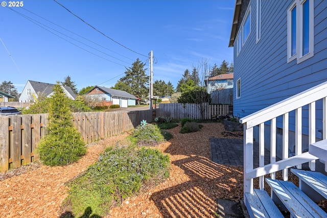 view of yard with fence