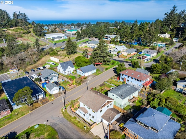 bird's eye view with a water view and a residential view