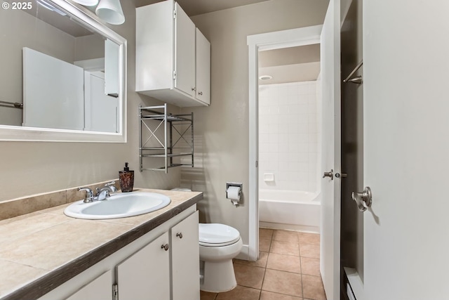 full bathroom featuring shower / bath combination, vanity, tile patterned floors, and toilet