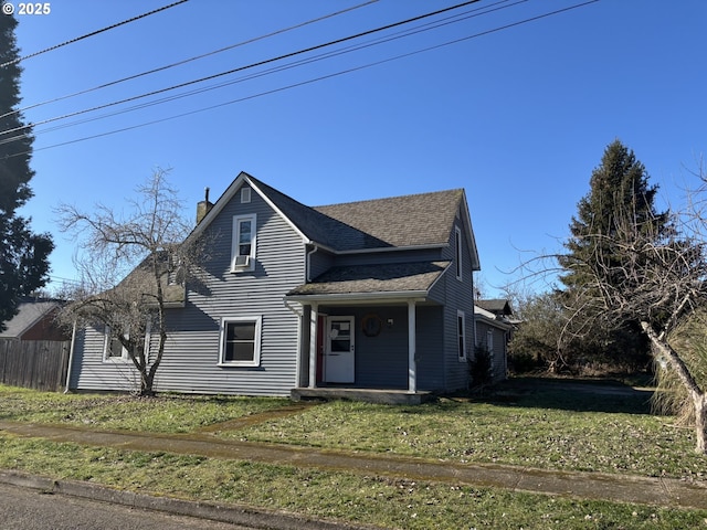 front facade featuring a front yard