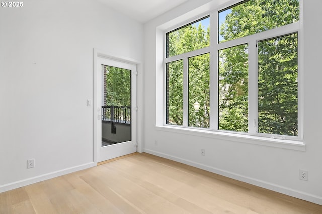 618 NW 12th Ave, Portland, OR 97209 - empty room featuring plenty of natural light and light wood-style floors