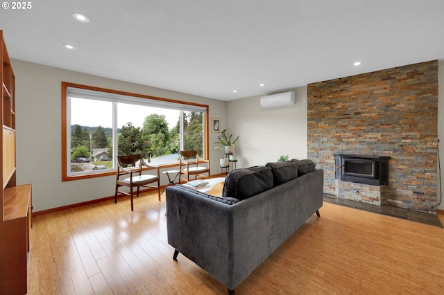 3765 Potter St, Eugene, OR 97405 - living area featuring an AC wall unit, wood finished floors, recessed lighting, and baseboards