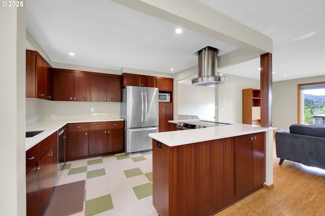 3765 Potter St, Eugene, OR 97405 - kitchen featuring stainless steel appliances, light flooring, light countertops, open floor plan, and island range hood
