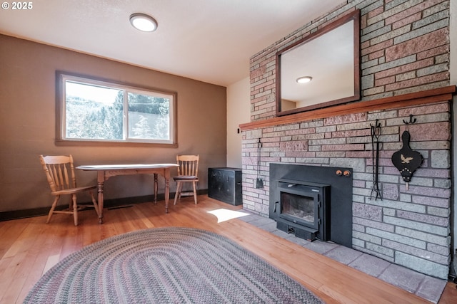 9602 Harlan Rd, Eddyville, OR 97343 - living room featuring baseboards and wood finished floors