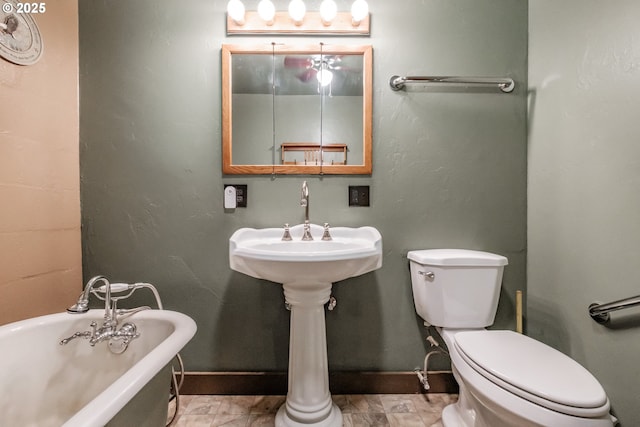 9602 Harlan Rd, Eddyville, OR 97343 - bathroom with a soaking tub and toilet