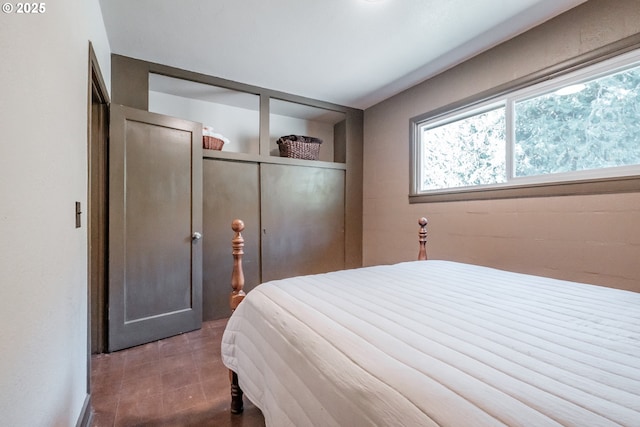 9602 Harlan Rd, Eddyville, OR 97343 - bedroom with tile patterned floors and a closet