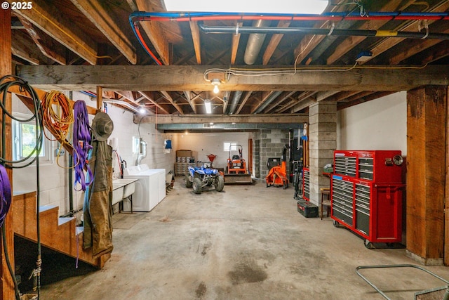 9602 Harlan Rd, Eddyville, OR 97343 - below grade area with separate washer and dryer and concrete block wall