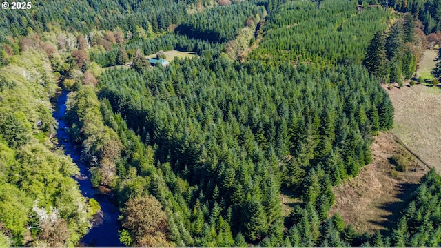 9602 Harlan Rd, Eddyville, OR 97343 - bird's eye view featuring a wooded view