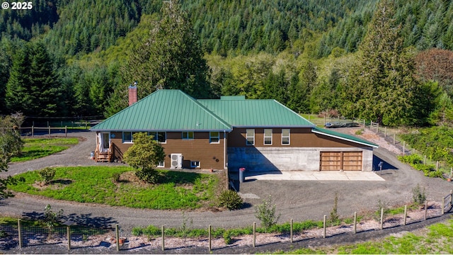 9602 Harlan Rd, Eddyville, OR 97343 - drone / aerial view featuring a wooded view