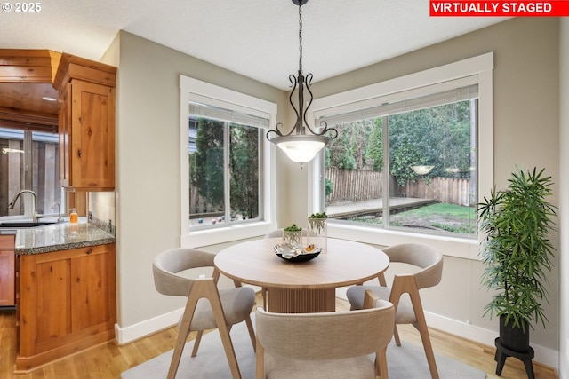 12955 SW Oxalis Ter, Portland, OR 97223 - dining room with light wood-type flooring
