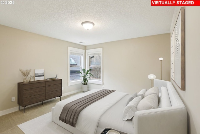 12955 SW Oxalis Ter, Portland, OR 97223 - bedroom featuring carpet and a textured ceiling