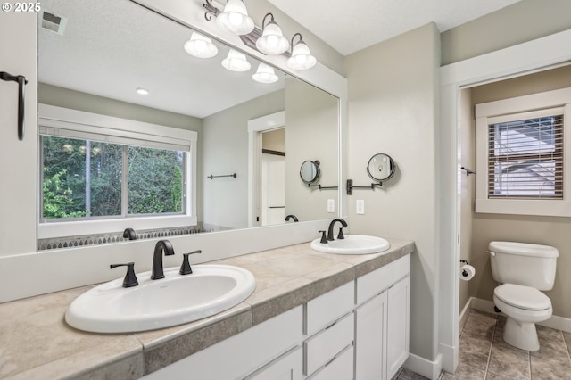 12955 SW Oxalis Ter, Portland, OR 97223 - bathroom featuring double vanity and toilet