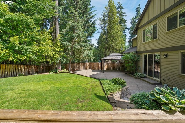 12955 SW Oxalis Ter, Portland, OR 97223 - fenced backyard with a gazebo and a patio area