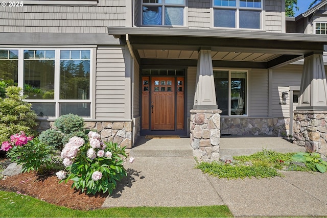 12955 SW Oxalis Ter, Portland, OR 97223 - entrance to property with stone siding and a porch