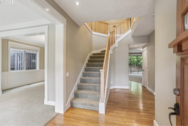 12955 SW Oxalis Ter, Portland, OR 97223 - stairway featuring wood finished floors and recessed lighting