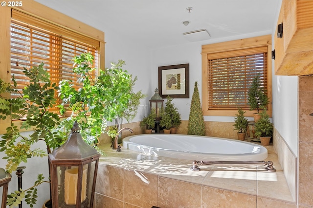 full bath with a bath