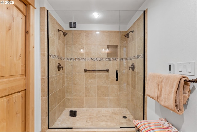 bathroom with a stall shower