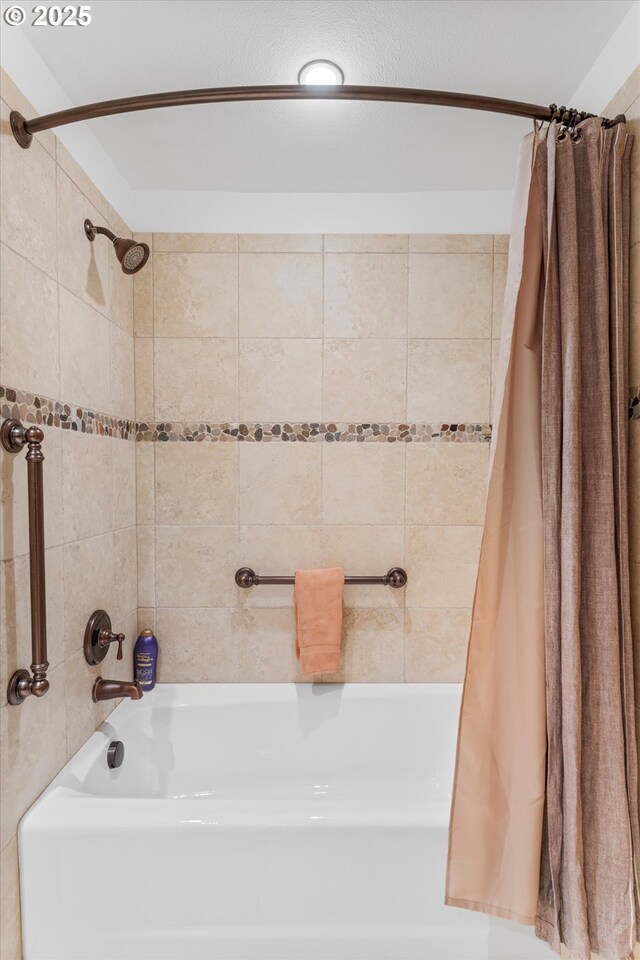 bathroom featuring shower / bath combo