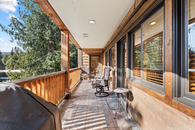 wooden terrace with visible vents