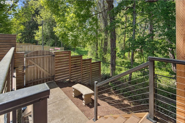 view of patio with a gate