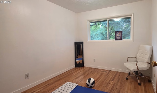 14128 NE Rose Pkwy, Portland, OR 97230 - unfurnished room with light wood-style flooring and baseboards