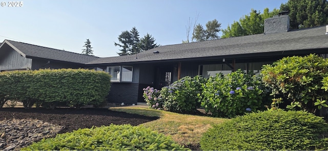 14128 NE Rose Pkwy, Portland, OR 97230 - view of front of home featuring a chimney