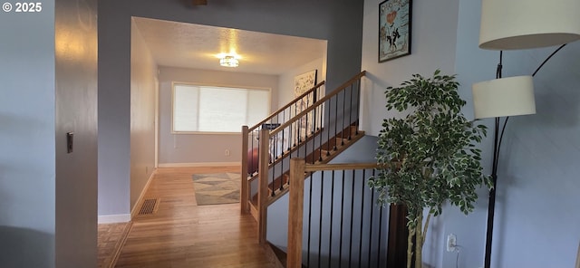 14128 NE Rose Pkwy, Portland, OR 97230 - foyer featuring wood finished floors and baseboards
