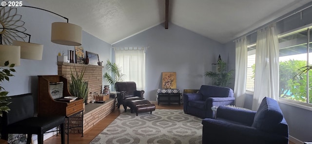 14128 NE Rose Pkwy, Portland, OR 97230 - living area with wood finished floors and a fireplace