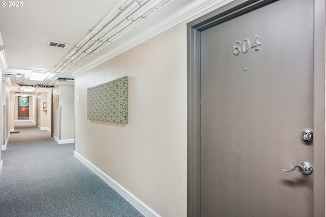 1205 SW Cardinell Dr Unit 604, Portland, OR 97201 - hall featuring baseboards and carpet flooring