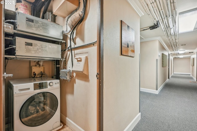 1205 SW Cardinell Dr Unit 604, Portland, OR 97201 - laundry area featuring washer / clothes dryer, baseboards, and carpet flooring