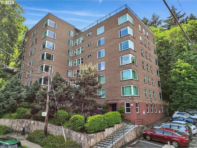 1205 SW Cardinell Dr Unit 604, Portland, OR 97201 - view of property with uncovered parking