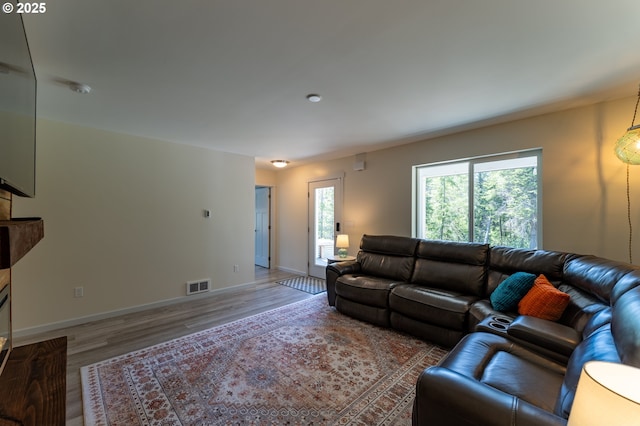 510 SE 130th Dr, Newport, OR 97366 - living area featuring wood finished floors and baseboards