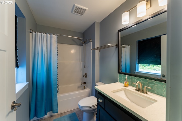 510 SE 130th Dr, Newport, OR 97366 - bathroom with shower / bath combo with shower curtain, vanity, tasteful backsplash, and wood finished floors