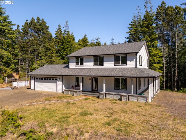 510 SE 130th Dr, Newport, OR 97366 - farmhouse-style home with a garage, covered porch, a shingled roof, and dirt driveway