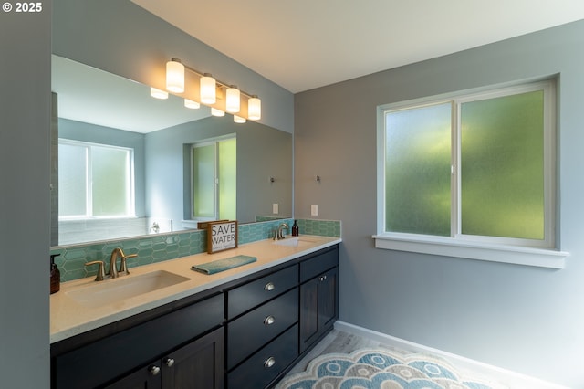 510 SE 130th Dr, Newport, OR 97366 - full bathroom with backsplash, double vanity, and wood finished floors