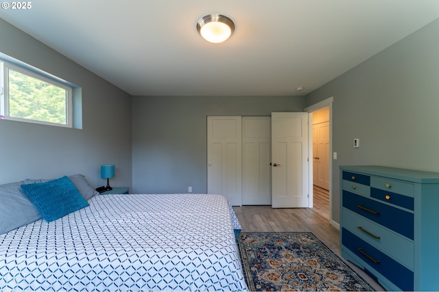 510 SE 130th Dr, Newport, OR 97366 - bedroom featuring wood finished floors and a closet