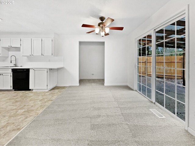157 SE 205th Dr, Gresham, OR 97030 - unfurnished living room with vaulted ceiling, wood walls, a ceiling fan, carpet floors, and baseboards